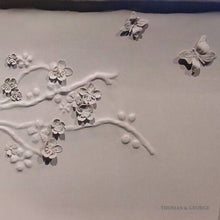 Load image into Gallery viewer, Nuovo Blossom Sculpted Leather Sleigh Bed thomas-george-gallery