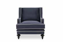 Load image into Gallery viewer, Navy armchair with white trim on a white background
